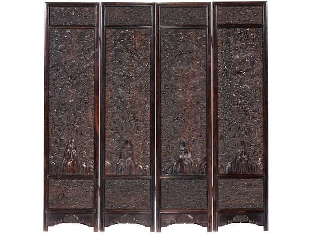 An impressive four-panel hongmu 'dragon' screen Early 20th century