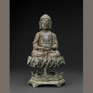 A lacquered bronze model of Buddha on a lotus petal double base