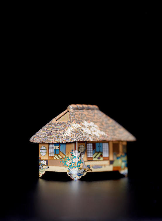  A fine cloisonné-enamel covered box in the form of a cottage 