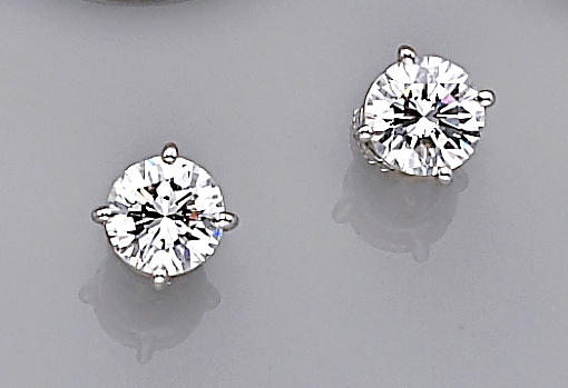 Bonhams : A pair of diamond solitaire earrings, Tiffany & Co.