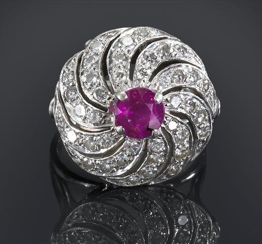 Bonhams : A ruby and diamond swirl ring