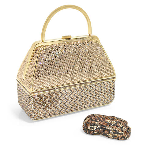 Bonhams : A gold and brown crystal purse together with a crystal laying ...