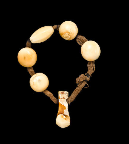 Bonhams : Rare and Possibly Unique Ivory and Cotton Wrist Ornament ...