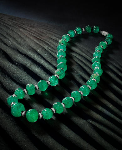 Bonhams : An art deco emerald bead, onyx and diamond necklace, Cartier,