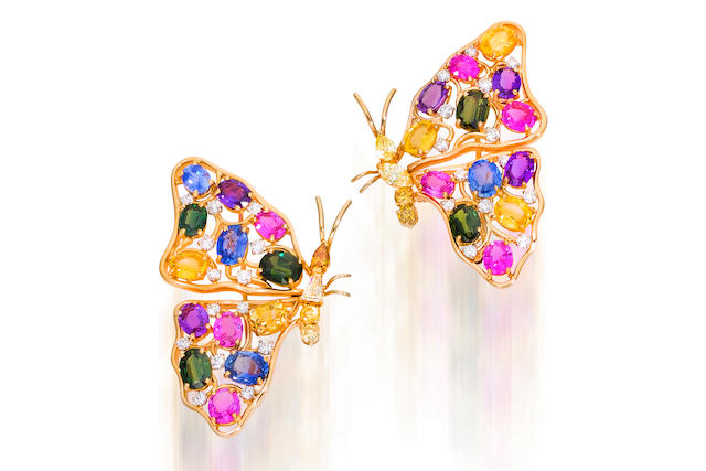 Bonhams : A pair of multi-colored sapphire and diamond brooches, Oscar ...