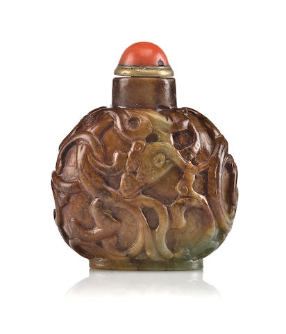 Bonhams : A jade snuff bottle with brown skin carved with interlaced ...