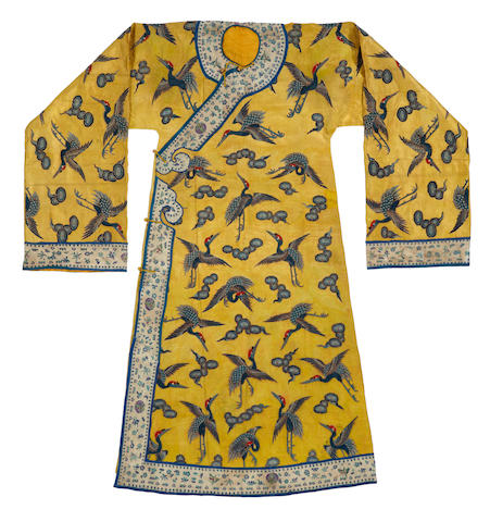 Bonhams : A yellow silk ground robe embroidered with cranes