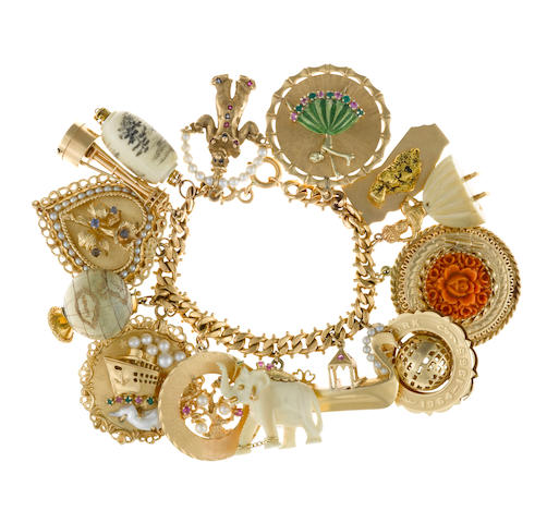 Bonhams : An eighteen karat gold charm bracelet