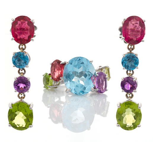 Bonhams : A gem-set ring together with a pair of earrings en suite, Asprey,