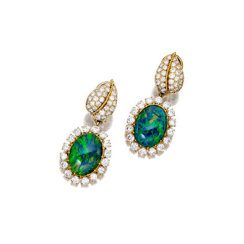 Bonhams : A pair of opal triplet and diamond day/night pendant earrings ...