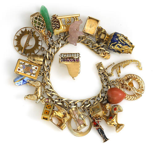 Bonhams : A 14k gold charm bracelet suspending twenty-four enamel ...