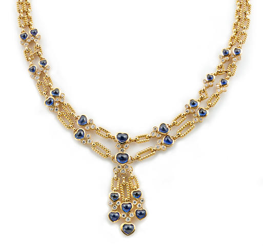 Bonhams : A sapphire and diamond heart motif necklace