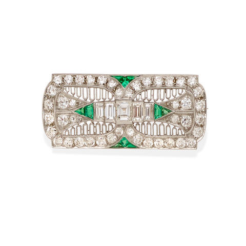 Bonhams : An Art Deco diamond, emerald and platinum brooch,