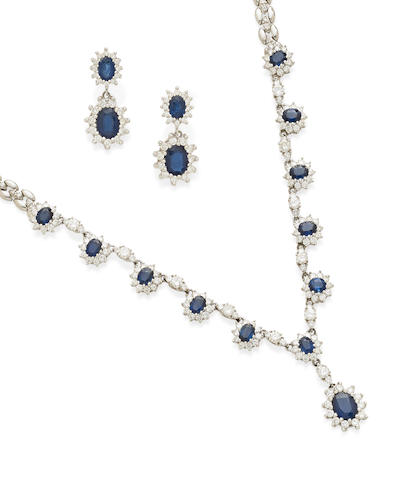 Bonhams : A Sapphire, diamond and white gold necklace and ear pendant set