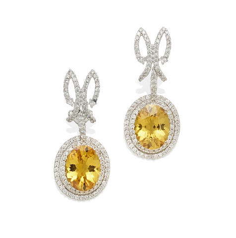 Bonhams : A pair of yellow sapphire and diamond ear pendants