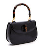 Thumbnail of A Gucci black patent leather handbag image 1