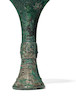 Thumbnail of AN ARCHAIC BRONZE WINE VESSEL, Gu  Late Shang/Early Western Zhou, 13th-11th centuries BCE image 3