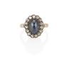 Thumbnail of A GOLD, SILVER-TOPPED GOLD, SAPPHIRE AND DIAMOND RING image 1