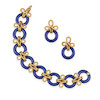 Thumbnail of A PAIR OF 18K GOLD AND ENAMEL EARCLIPS AND BRACELET SET image 1