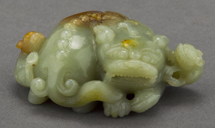 Bonhams : A jade carving of three mythical beasts