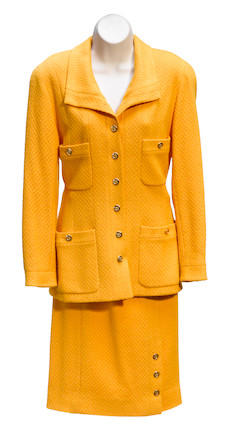 Bonhams : A Chanel yellow bouclé jacket and skirt suit