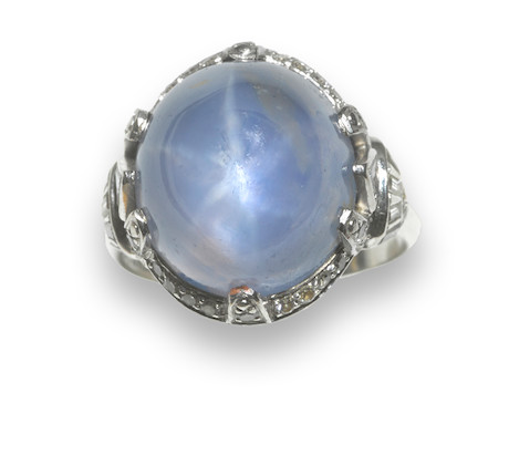 Bonhams : An art deco star sapphire and diamond ring,