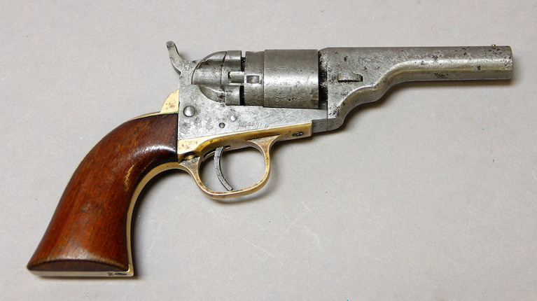 Bonhams : A Colt round barrel Original Metallic Cartridge revolver