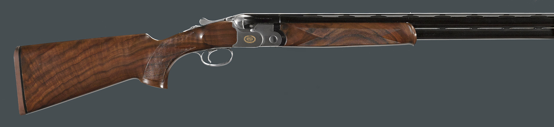 Bonhams : A cased 12 gauge Beretta ASE 90 Sporting over/under shotgun