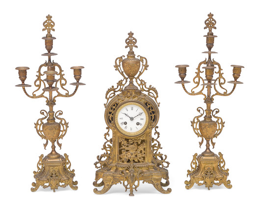 Bonhams : A French gilt metal three piece clock garniture Late 19th ...