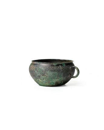 AN ARCHAIC BRONZE OVAL BOWL WITH RING HANDLE (HE) Eastern Zhou dynasty, 6th-5th century B.C. image 1