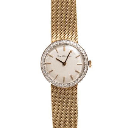 Bonhams Skinner : GIRARD-PERREGAUX A 14K GOLD AND DIAMOND WRISTWATCH