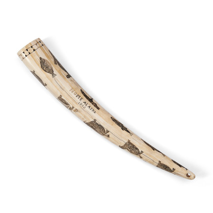 Bonhams Skinner : An Eskimo walrus tusk cribbage board lg. 16 in.