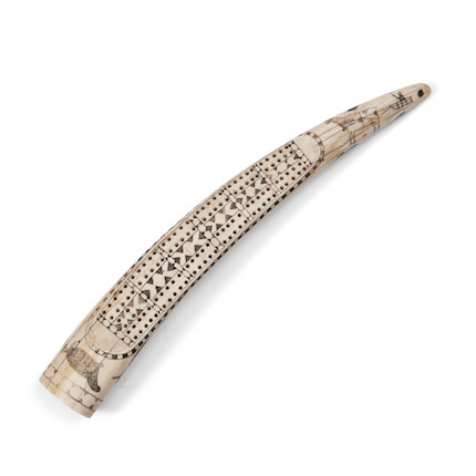 Bonhams Skinner : An Eskimo walrus tusk cribbage board lg. 16 in.