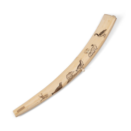 Bonhams Skinner : An Eskimo walrus tusk cribbage board lg. 18 1/2 in.