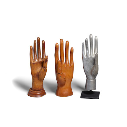 Bonhams : A GROUP OF THREE HAND MODELS early 20th century, two made of ...