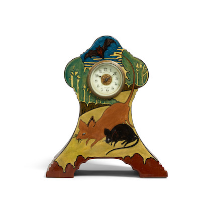 A ROZENBURG GLAZED EARTHENWARE MANTLE CLOCK circa 1905, depicting two mice and a bat in a landscape, signed 'Rozenburg 1529 den Haag' with stork mark and incised 'VW394'height 9 1/4in (23.5cm); width 8in (20.3cm); depth 3 1/2in (8.8cm) image 1