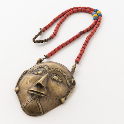 A Naga brass pectoral ornament size of brass head 4 1/4 x 3 1/2 in. image 3
