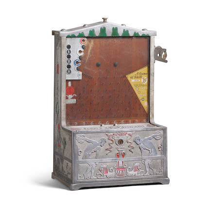 A MILLS NOVELTY COIN DROP GAME circa 1926, the aluminum chassis depicting two discus throwersheight 19in (48.3cm); width 13 1/4in (33.6cm); depth 7 1/2in (19cm) image 1