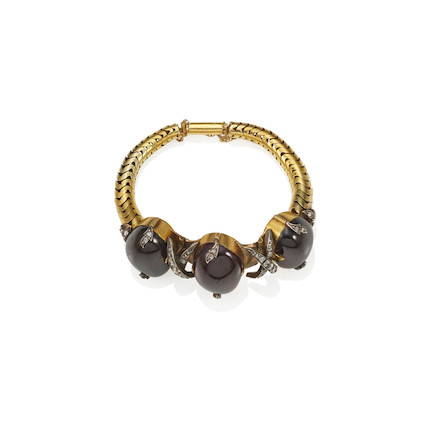 A GOLD, SILVER-TOPPED GOLD, GARNET AND DIAMOND BRACELET image 2