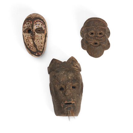 Three tribal masks ht. 12, wd. 7, ht. 9 1/8, wd. 6 3/4, and ht. 10, wd. 5 1/2 in. image 1