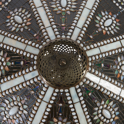 Tiffany Studios Empire Jewel Table Lamp, New York, New York, 1910-1913, leaded glass and patinated bronze, shade with stamped mark Tiffany Stvdios N.Y. 1958, dia. 23 1/4, with an Old English base, four-socket cluster, Perkins paddle switches, stamped mark Tiffany Studios New York 557, total ht. 25 3/4 in.Literature Alistair Duncan, Tiffany Lamps and Metalwork, (new edition), shade, plate 833, p. 214, base, plate 834, p. 215. image 3