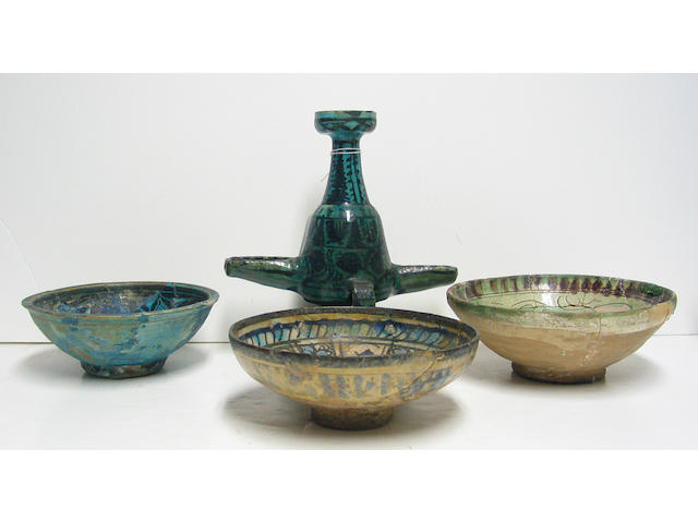 Four Islamic pottery vessels