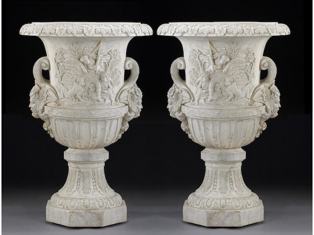 A pair of monumental Neoclassical style white marble urns