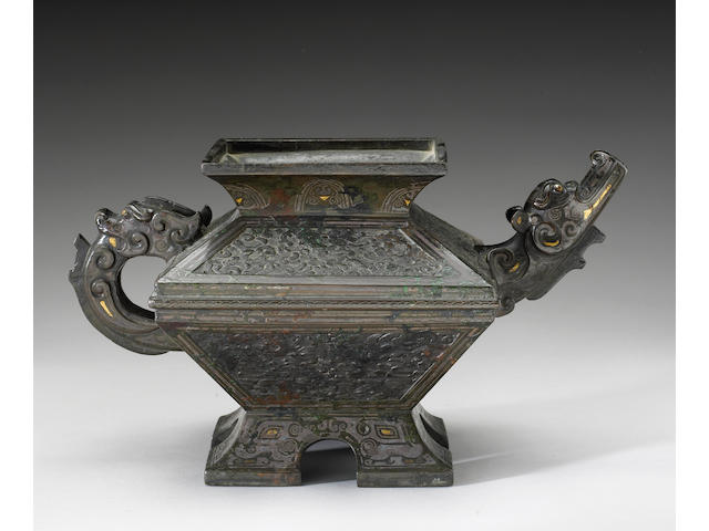 A  gilt and silver-inlaid bronze archaistic ewer Song/Ming Dynasty