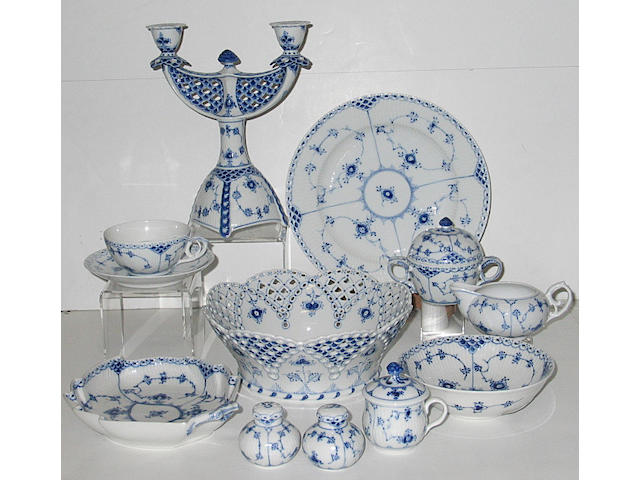 A Royal Copenhagen porcelain blue and white assembled partial dinner service in various &#8216;Blue Fluted&#8217; patterns
