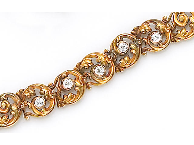 A diamond and fourteen karat gold bracelet,