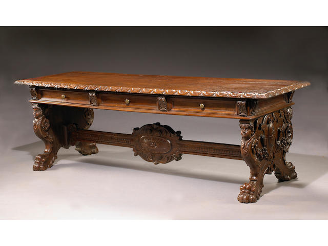 A fine Italian Renaissance style walnut library table