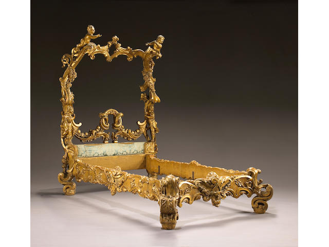 A Venetian Rococo style giltwood bed