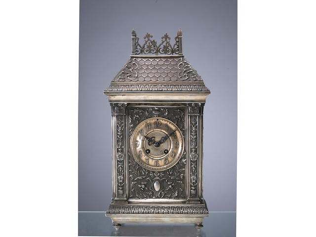 A Renaissance Revival silver cased mantel clock