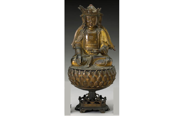 A gilt bronze two-section seated Shakyamuni Ming Dynasty